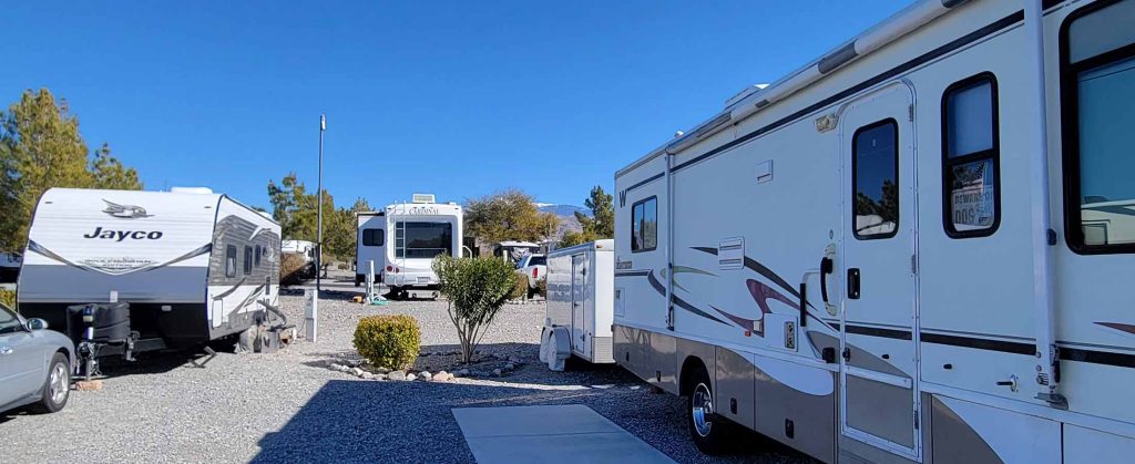 Luxury RV site at Wine Ridge RV Resort & Cottages with scenic desert backdrop